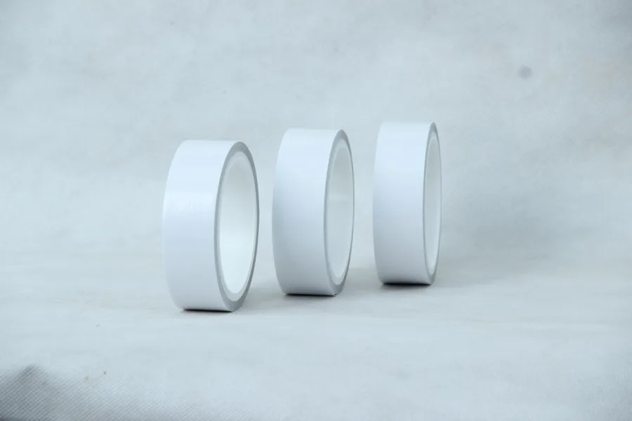 Three rolls of carrier-free double-sided tape (brochure product photo)