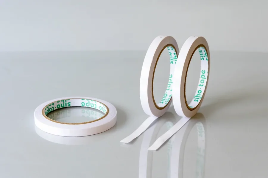 Narrow rolls of tissue double-sided tape (brochure product photo)