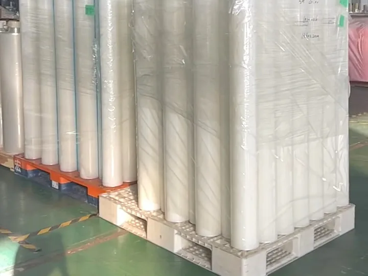 Finished rolls, stretch-wrapped on pallets in the warehouse